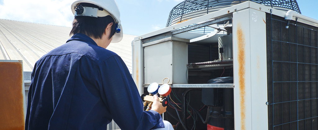 AC Service Technician Testing AC Unit